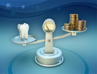 Tooth and coins on balance scale