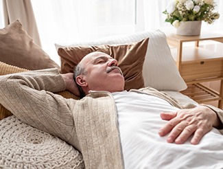 Man resting on a couch