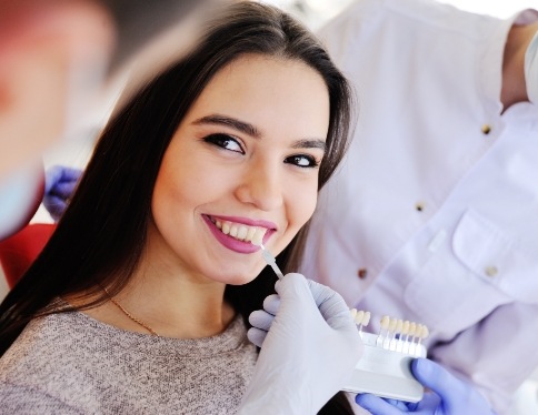 Woman's transformed smile after porcelain veneers